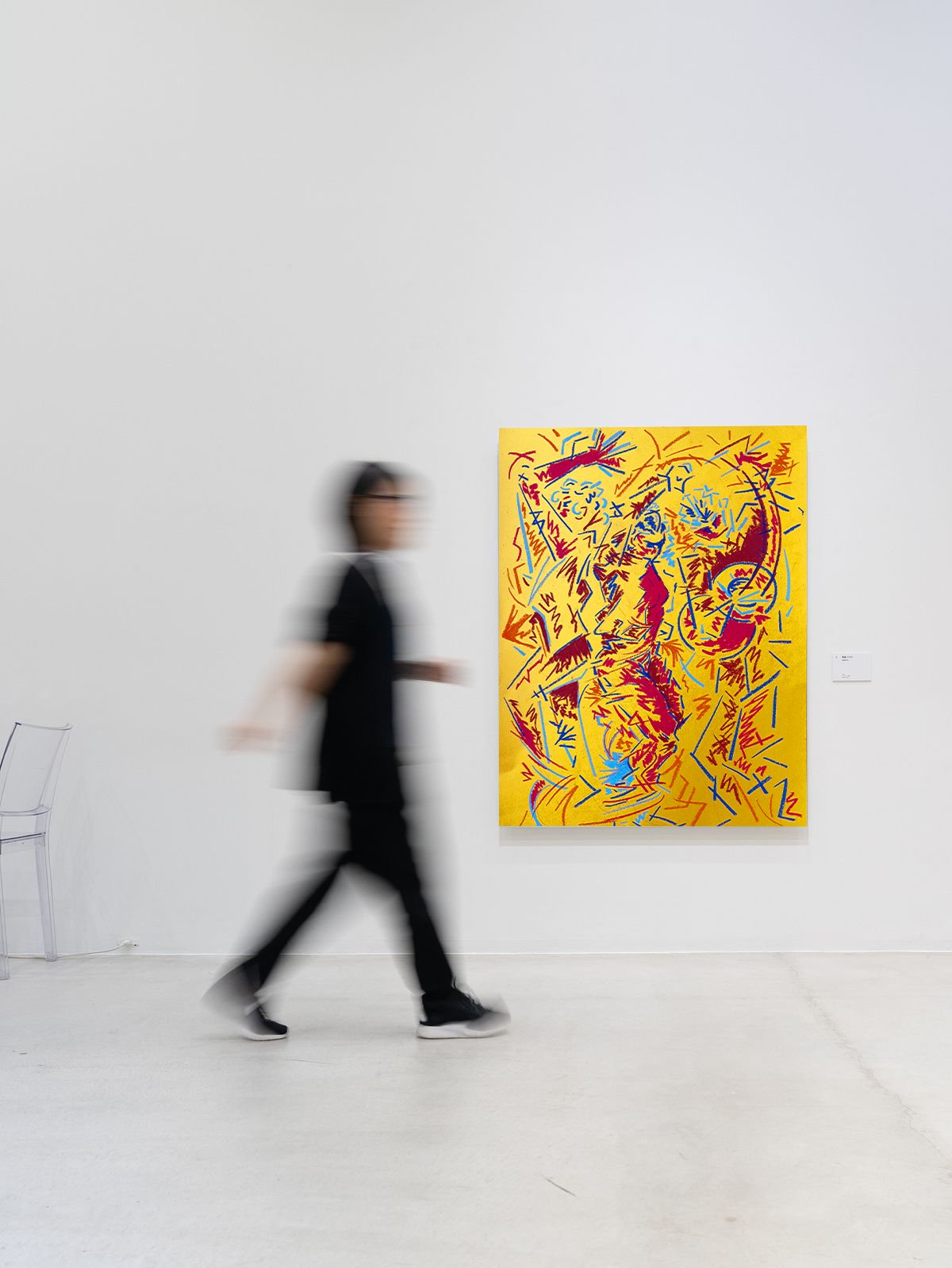 Oil pastel painting titled Flamenco Dancers, abstract red and blue figures on a yellow ground, shown on a gallery wall