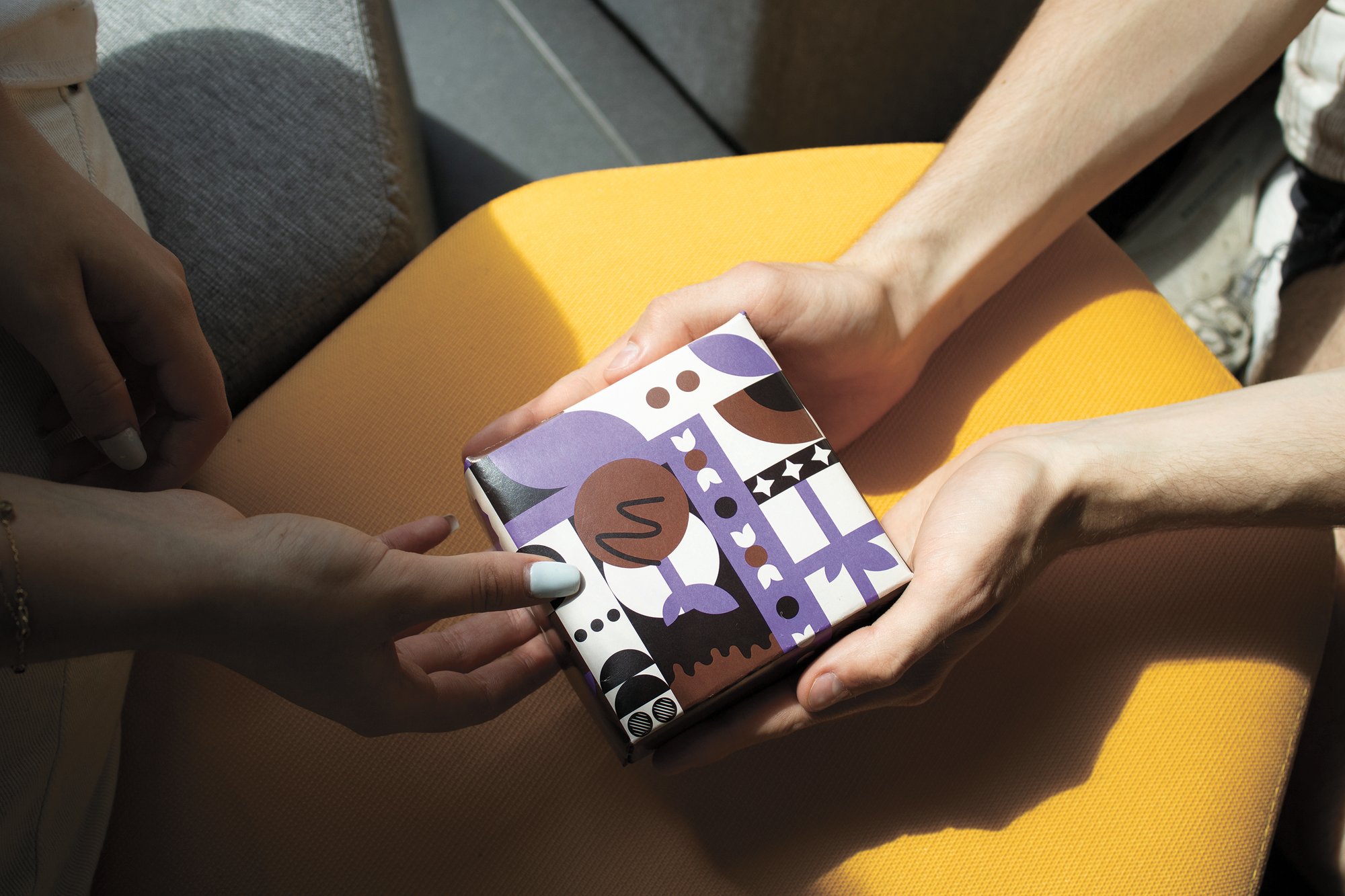 Cioro chocolate packaging — a small purple and brown patterned box